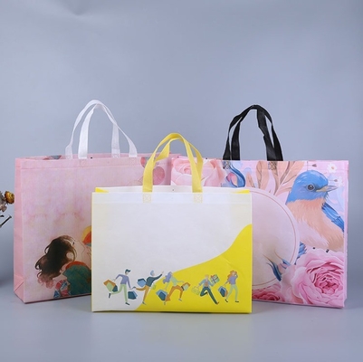 Sacs à main pliables non tissés Emballage personnalisé avec support portable de logo