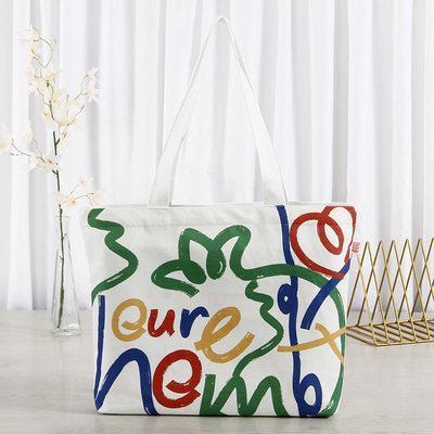 Sac de magasinage en toile de couleur personnalisé de grande capacité avec conception et logo du visage souriant